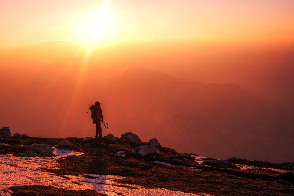 man hiking during daytime