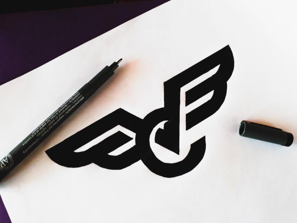A black symbol drawing made with a black pen.