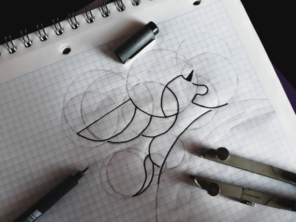 An abstract animal drawing with a black pen.