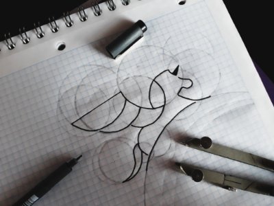 An abstract animal drawing with a black pen.