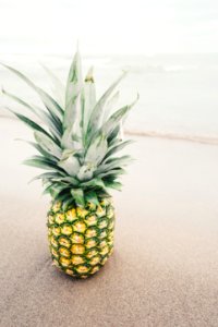 pineapple fruit on gray surface
