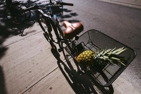 pineapple on bike basket photo