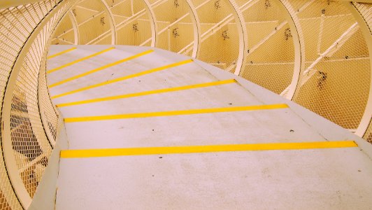 photo of white and yellow concrete stairs photo