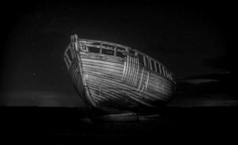 wrecked boat in monochrome photo photo