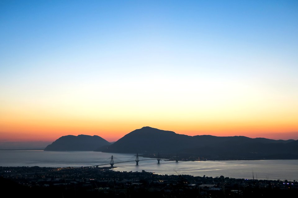 aerial photo of concrete bridge during golden hour