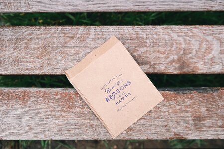 Paper bag note outdoors photo