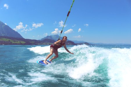 person surfing on seashore photo