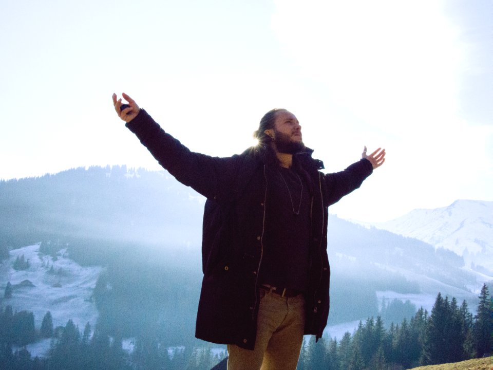 man wearing black jacket