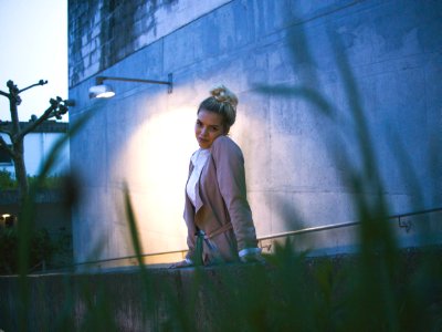 woman wearing beige coat