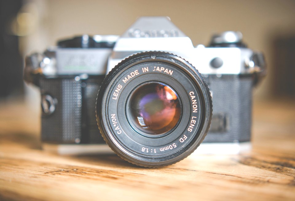gray and black DSLR camera in shallow focus photography