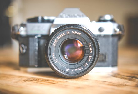 gray and black DSLR camera in shallow focus photography photo