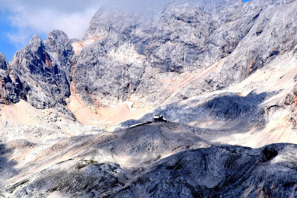 gray mountain under blue sky at daytime photo