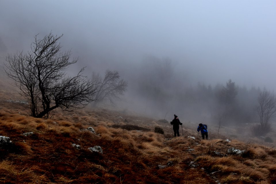 two people hiking on the mountain