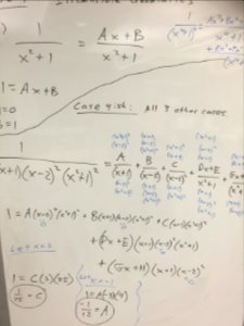 Algebra equations on a whiteboard. photo