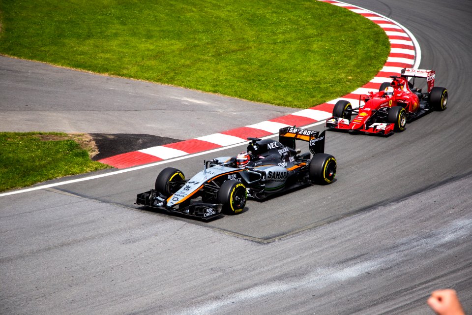 black and red racing car during daytime