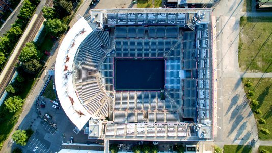 aerial photography of grey concrete stadium photo