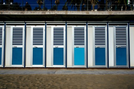 closed silver-and-teal doors