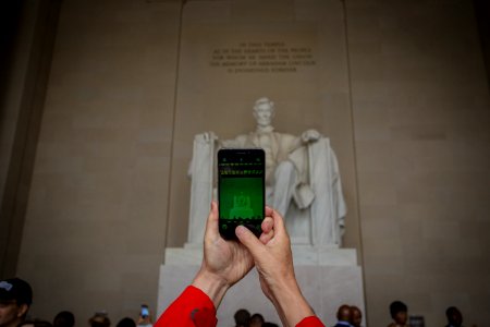 person holding black smartphone