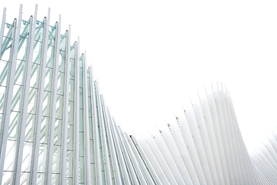 photo of white painted building at daytime