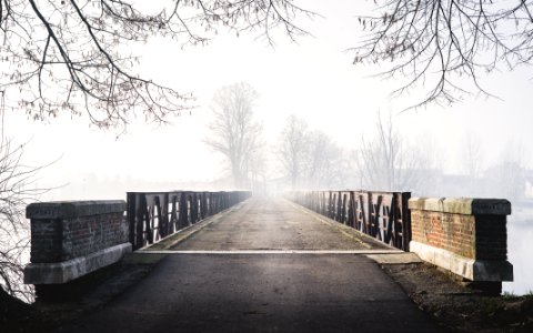 empty gray and black bridge during daytime photo