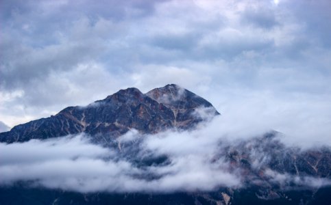mountain covered by clouds photo