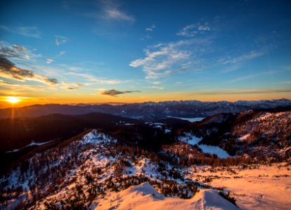 aerial view of trees and mountain during sunset photo