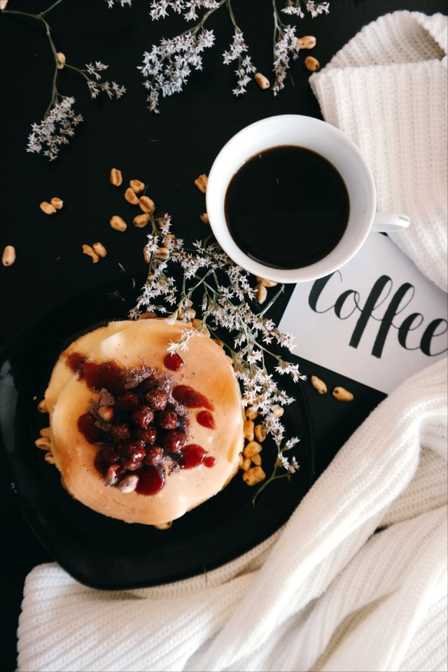 A plate of food with a cup of coffee. photo