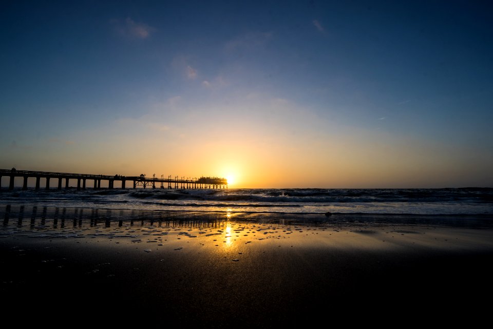dock on shore at sunrise