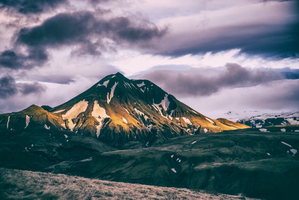 mountain coated with snow during daytime photo