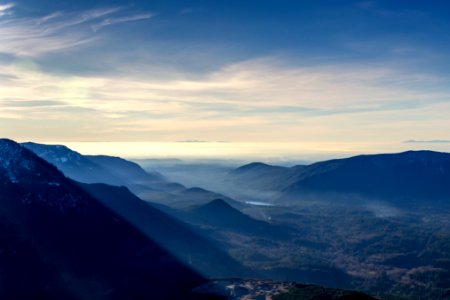 mountain covered by fogs