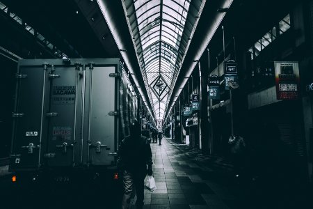 person walking beside truck photo