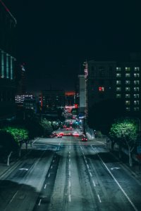 cars on gray asphalt road during nighttime photo