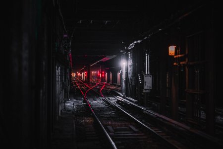 photography of railroad during nighttime photo