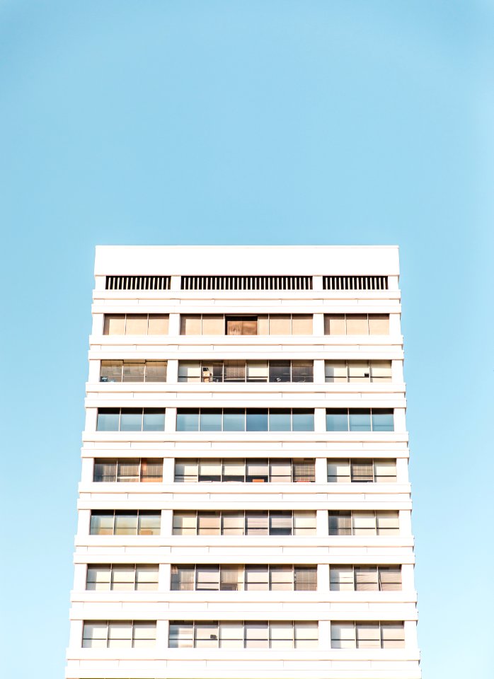 white building with glass windows
