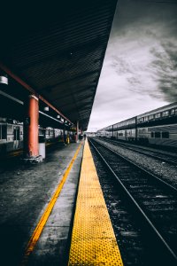 selective color photography of train railways