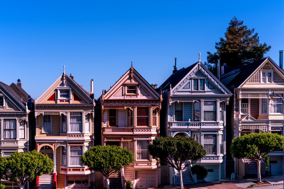 five 3-storey houses in-lined on street