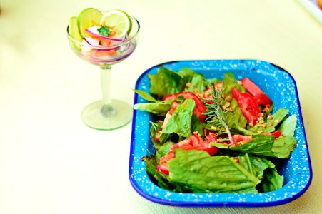 green vegetable salad on blue ceramic bowl