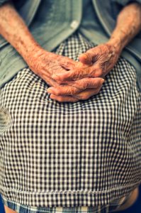 person's hand in shallow focus photo