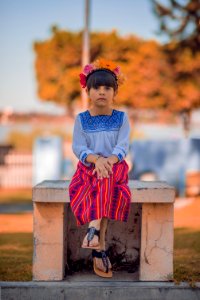 girl sitting on bench