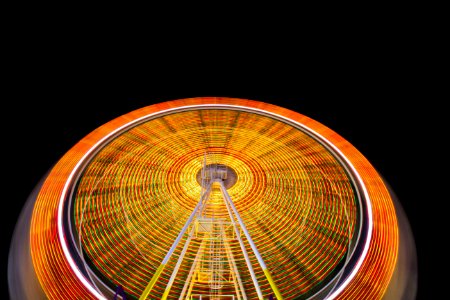 time lapse photography of ferris wheel
