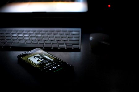 smartphone beside keyboard