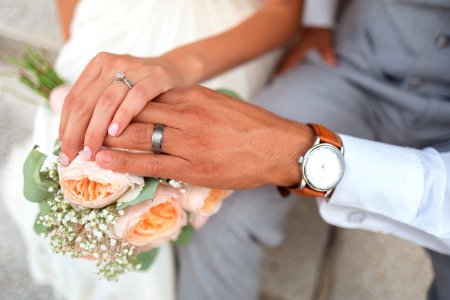 man and woman holding hands