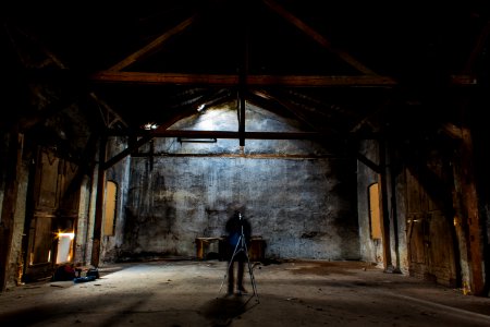 man standing inside building photo