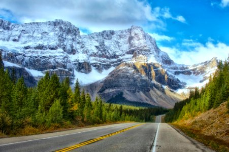 landscape photography of concrete road near the mountains photo