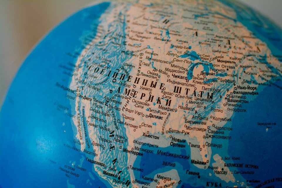 blue and brown world globe photo