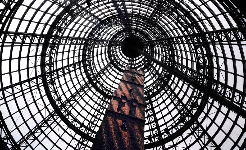 low angle photography of black metal framed tower photo