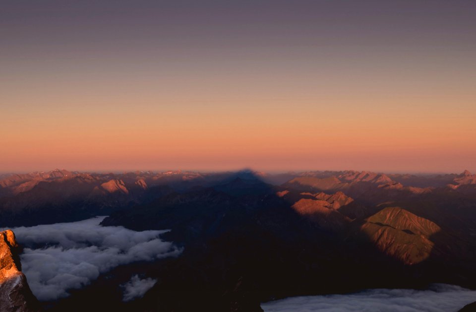 mountains and clouds during sunset photo