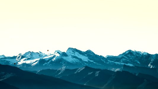 snow covered mountain under white sky during daytime photo