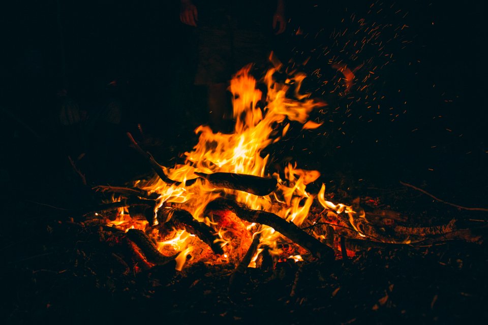 burning firewood at night