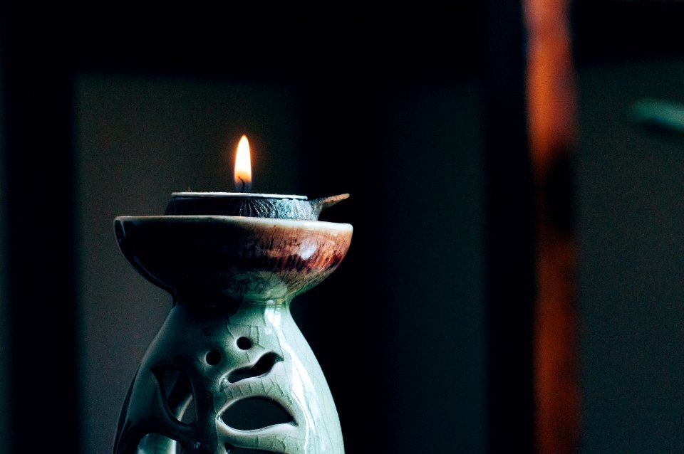 rule of thirds photography of lit candle photo
